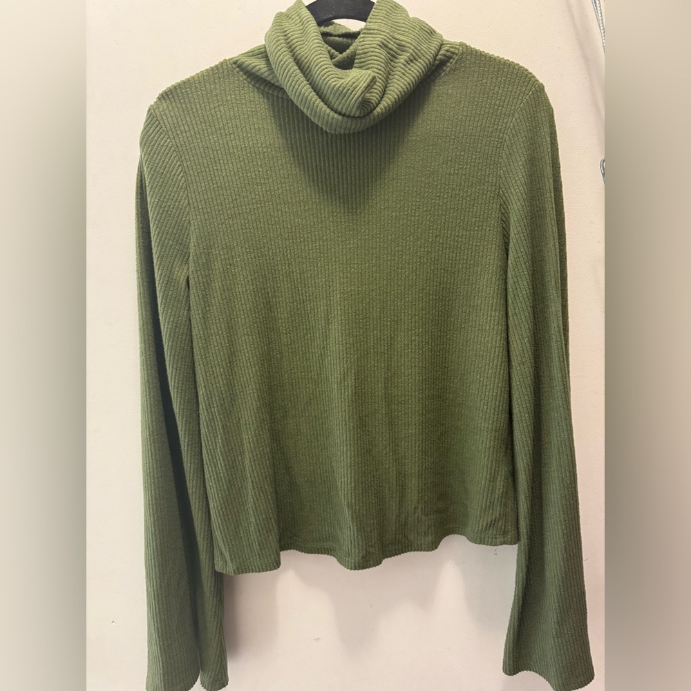 Green bell bottom turtle neck